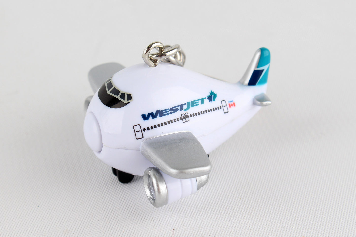 WestJet Airplane Keychain W/Light & Sound