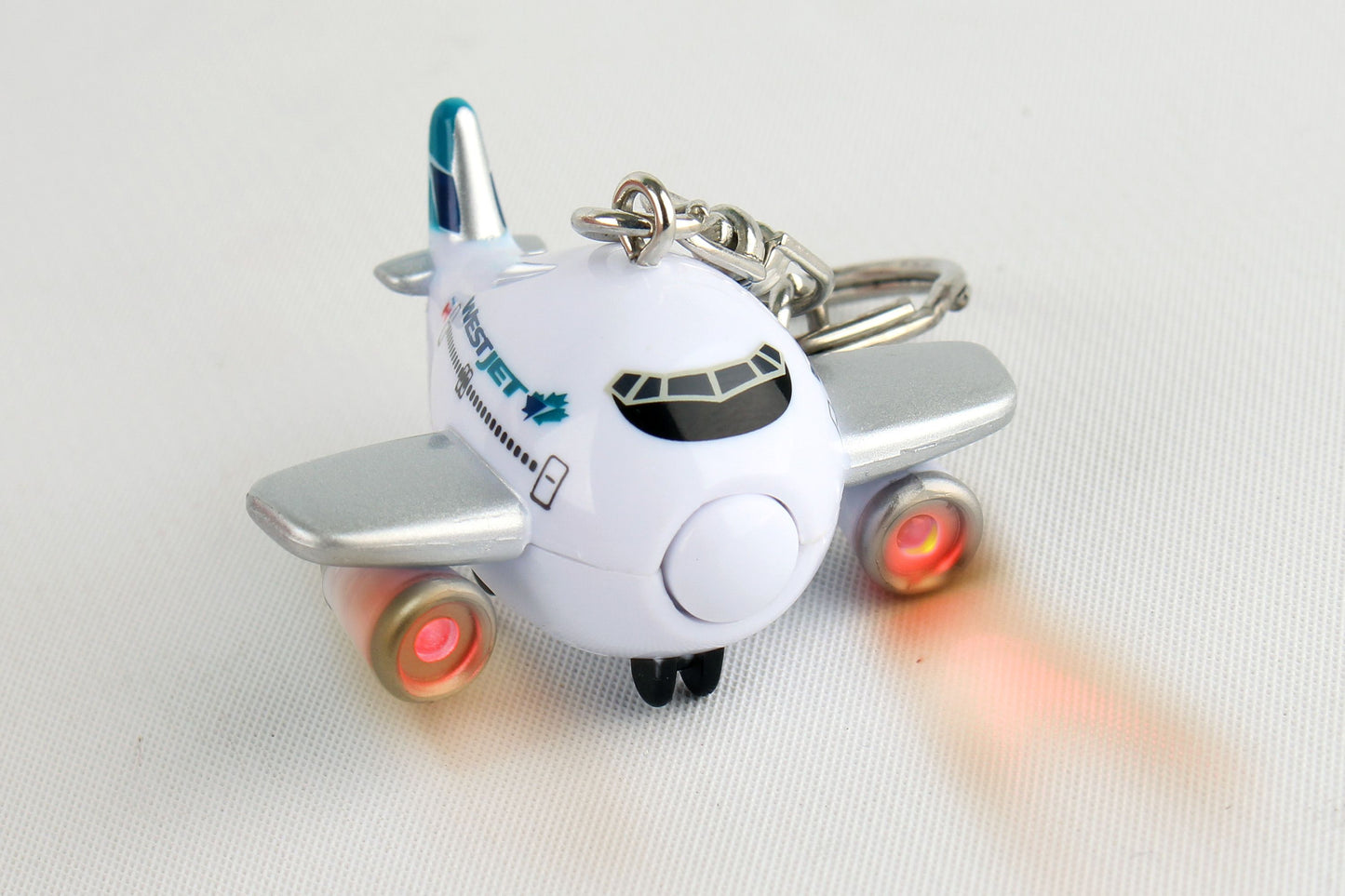 WestJet Airplane Keychain W/Light & Sound