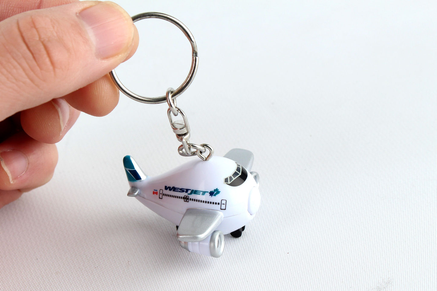 WestJet Airplane Keychain W/Light & Sound